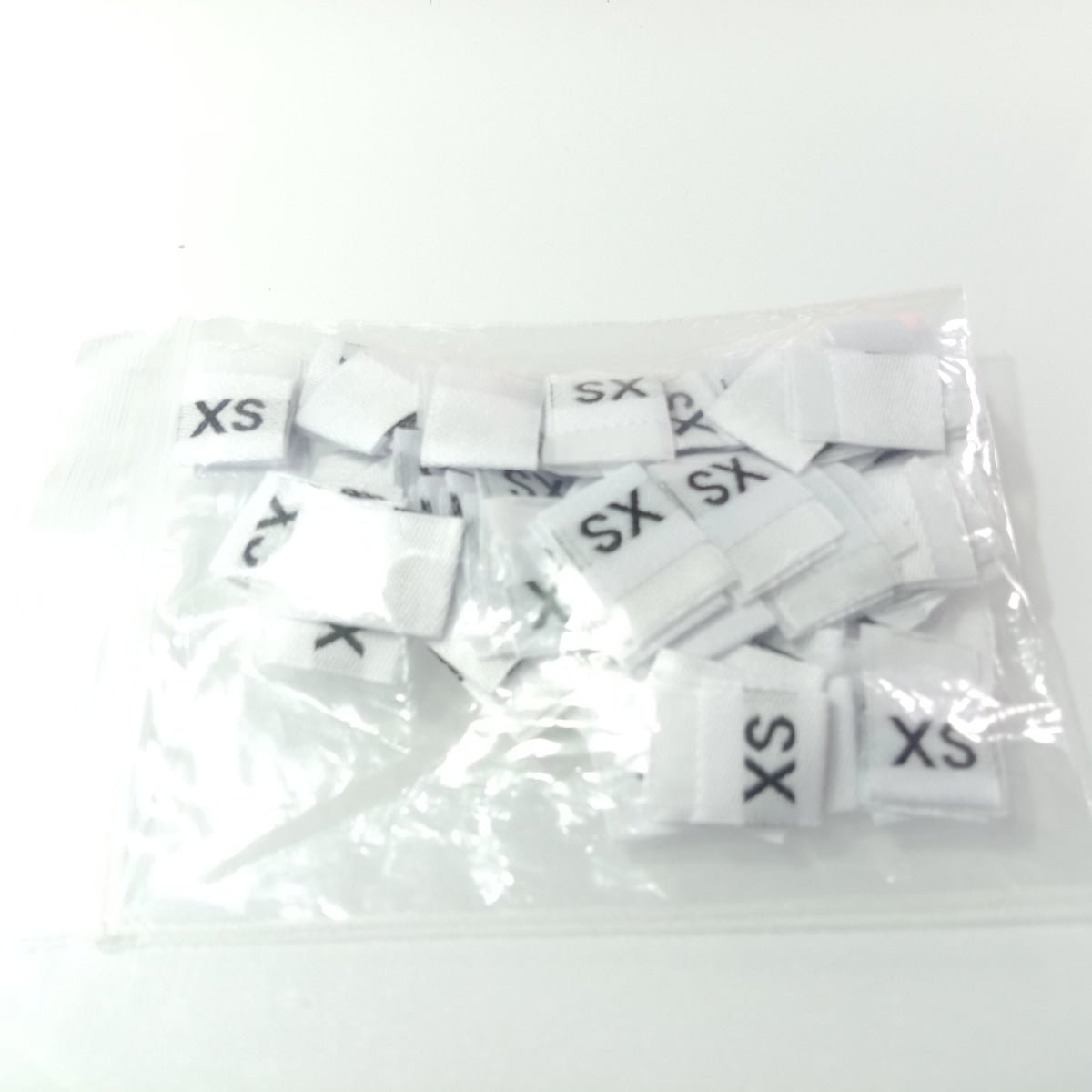 100pcs Clothing Size Label Tags XS S M L XL 2XL 3XL 4XL Black Text White Garment Clothes T Shirt Dress Fabric - S white - Asia Sell