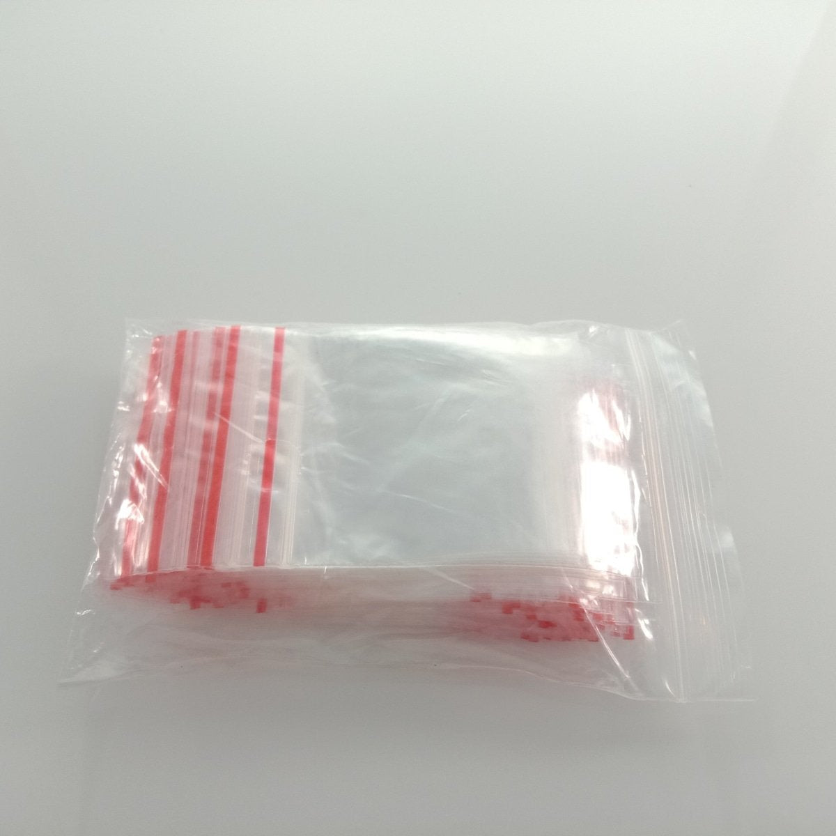 100pcs 4-15cm Plastic Zip Bags Clipseal Sealer Satchels Decent Grip at Edge Thin Non-Food Safe - 5x7cm - - Asia Sell