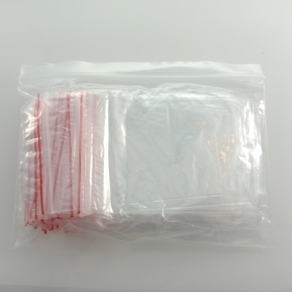 100pcs 4-15cm Plastic Zip Bags Clipseal Sealer Satchels Decent Grip at Edge Thin Non-Food Safe - 7x10cm - - Asia Sell