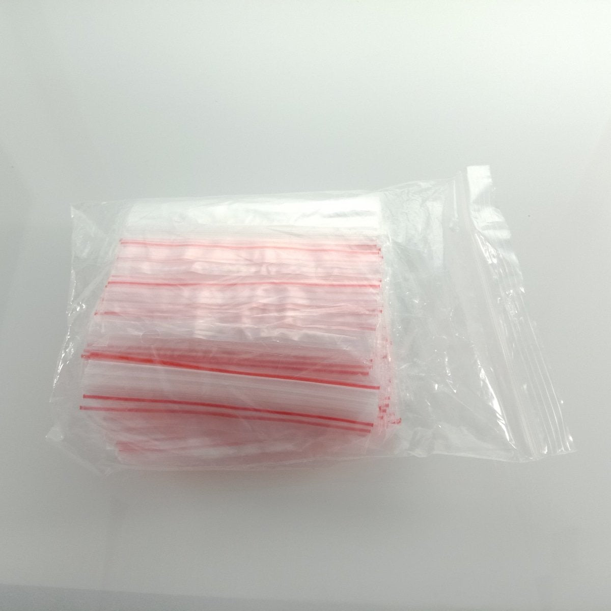 100pcs 4-15cm Plastic Zip Bags Clipseal Sealer Satchels Decent Grip at Edge Thin Non-Food Safe - 9x13cm - - Asia Sell