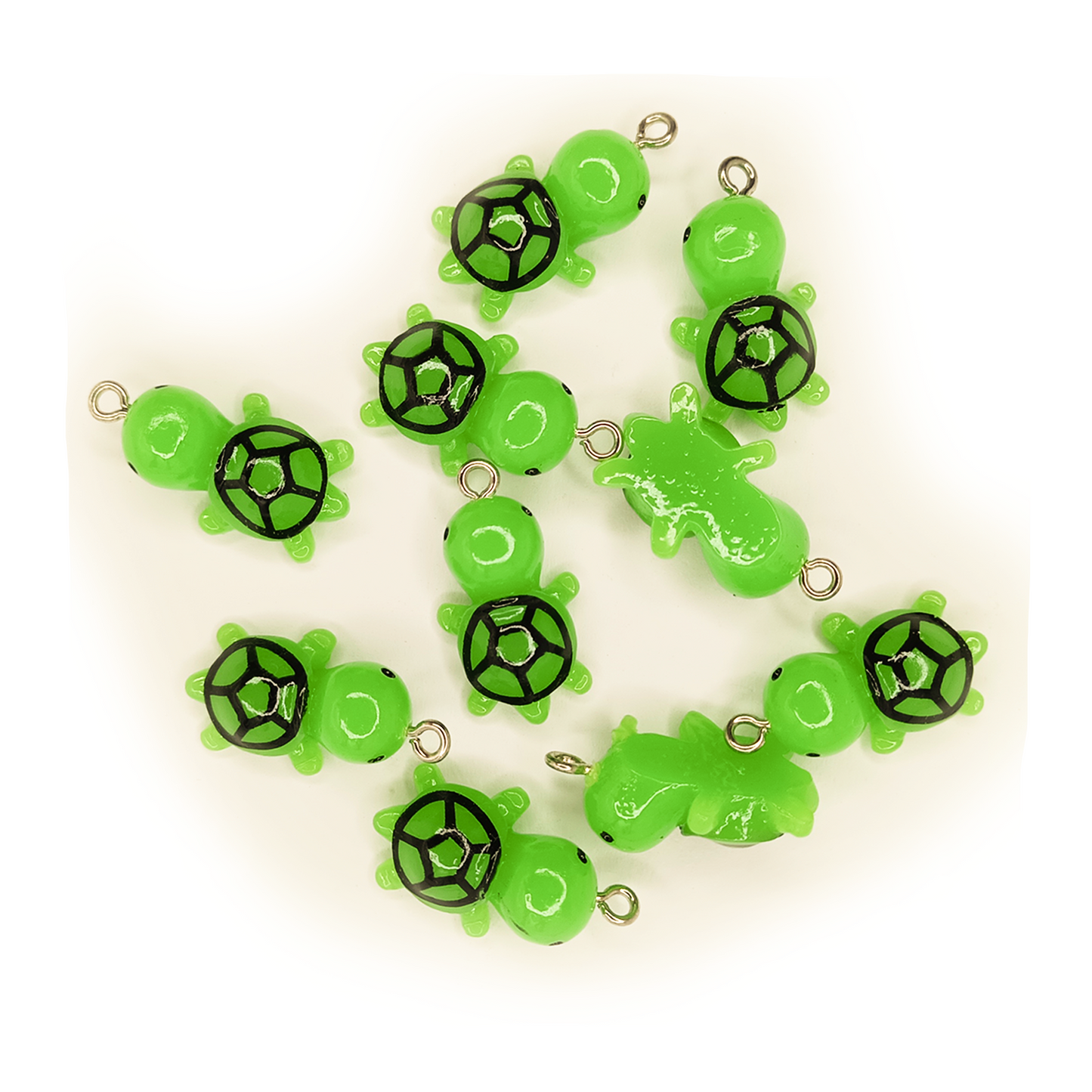 Green turtle-shaped charms with black shell outline on a white background