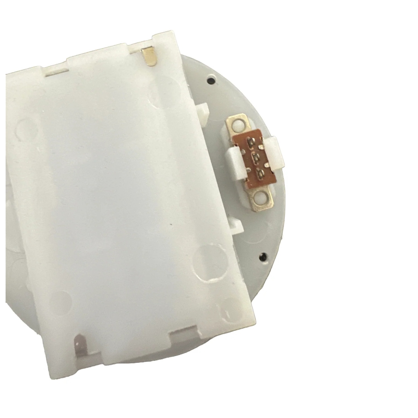 Close-up of the underside pins of a white plastic round battery holder on a white background