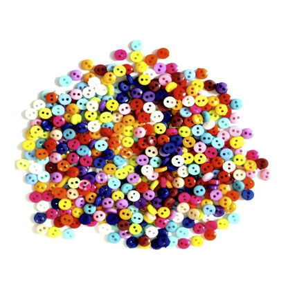 Multicolored round beads on a white background