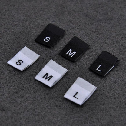 100pcs Clothing Size Label Tags XS S M L XL 2XL 3XL 4XL Black Text White Garment Clothes T Shirt Dress Fabric - 2XL Black - Asia Sell