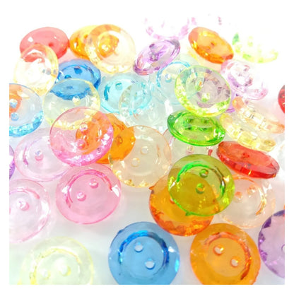 Assorted colorful buttons on a white background