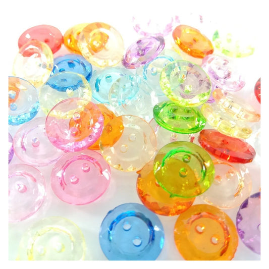 Assorted colorful buttons on a white background