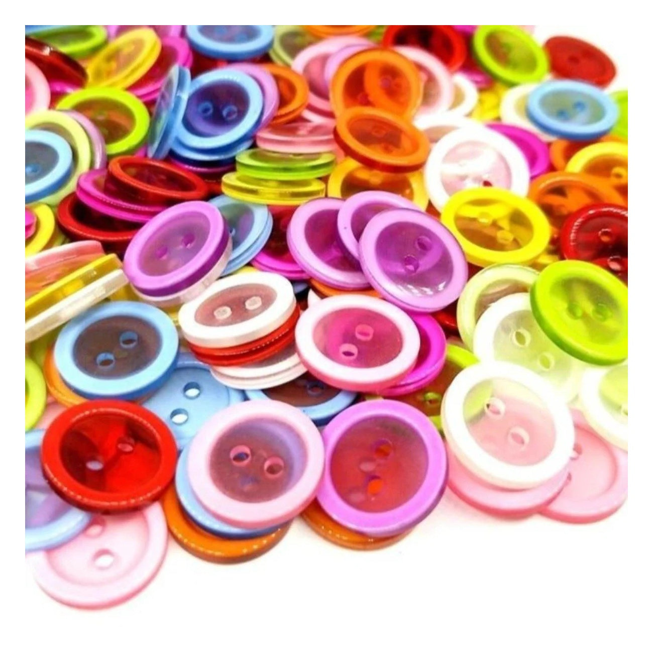 Assorted colorful buttons on a white background