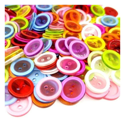Assorted colorful buttons on a white background