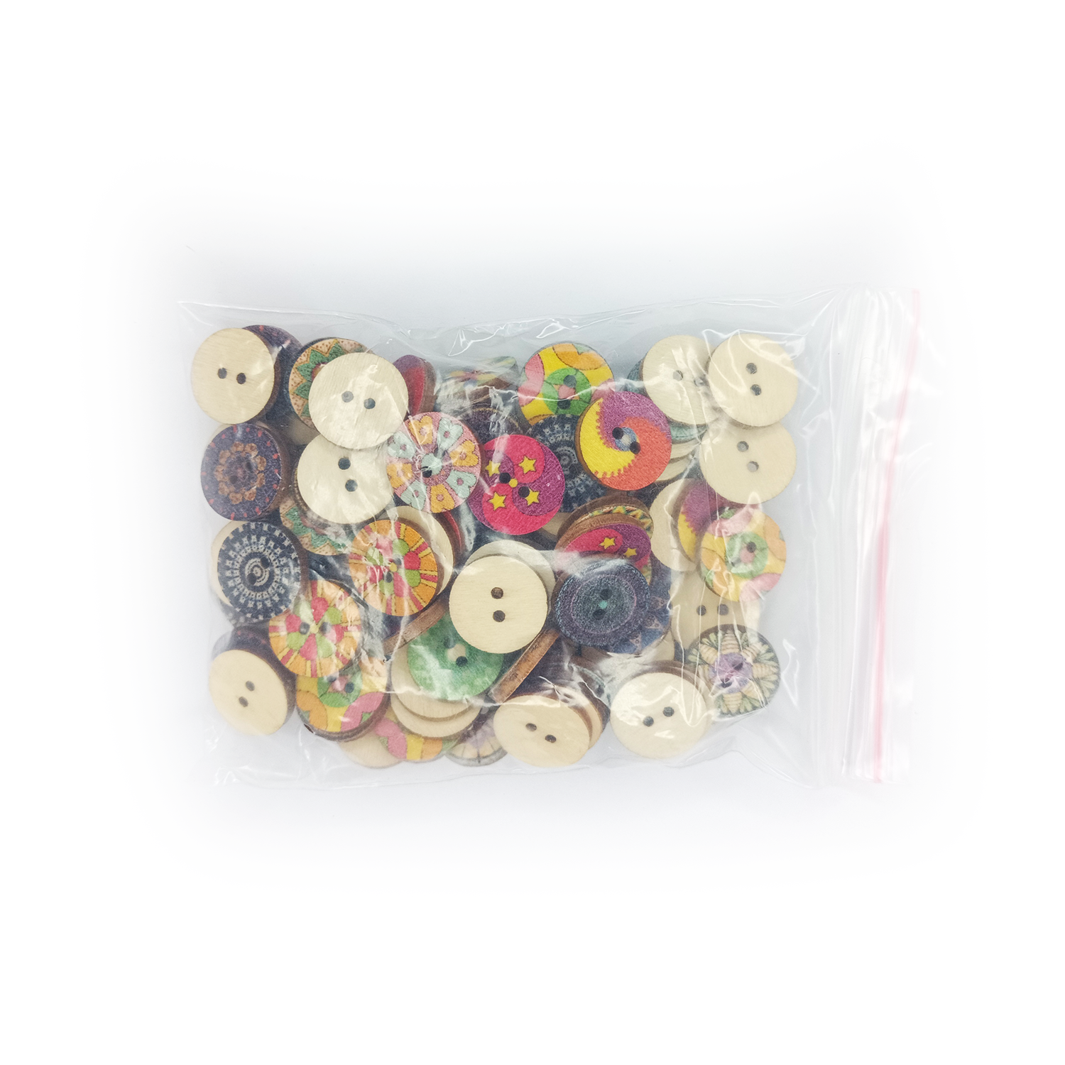 Assorted colorful wooden buttons in a clear plastic bag on a white background
