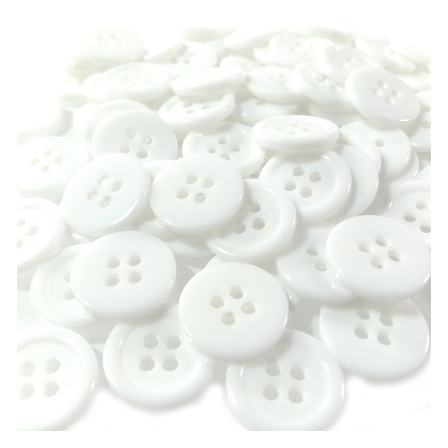 White buttons scattered on a white background