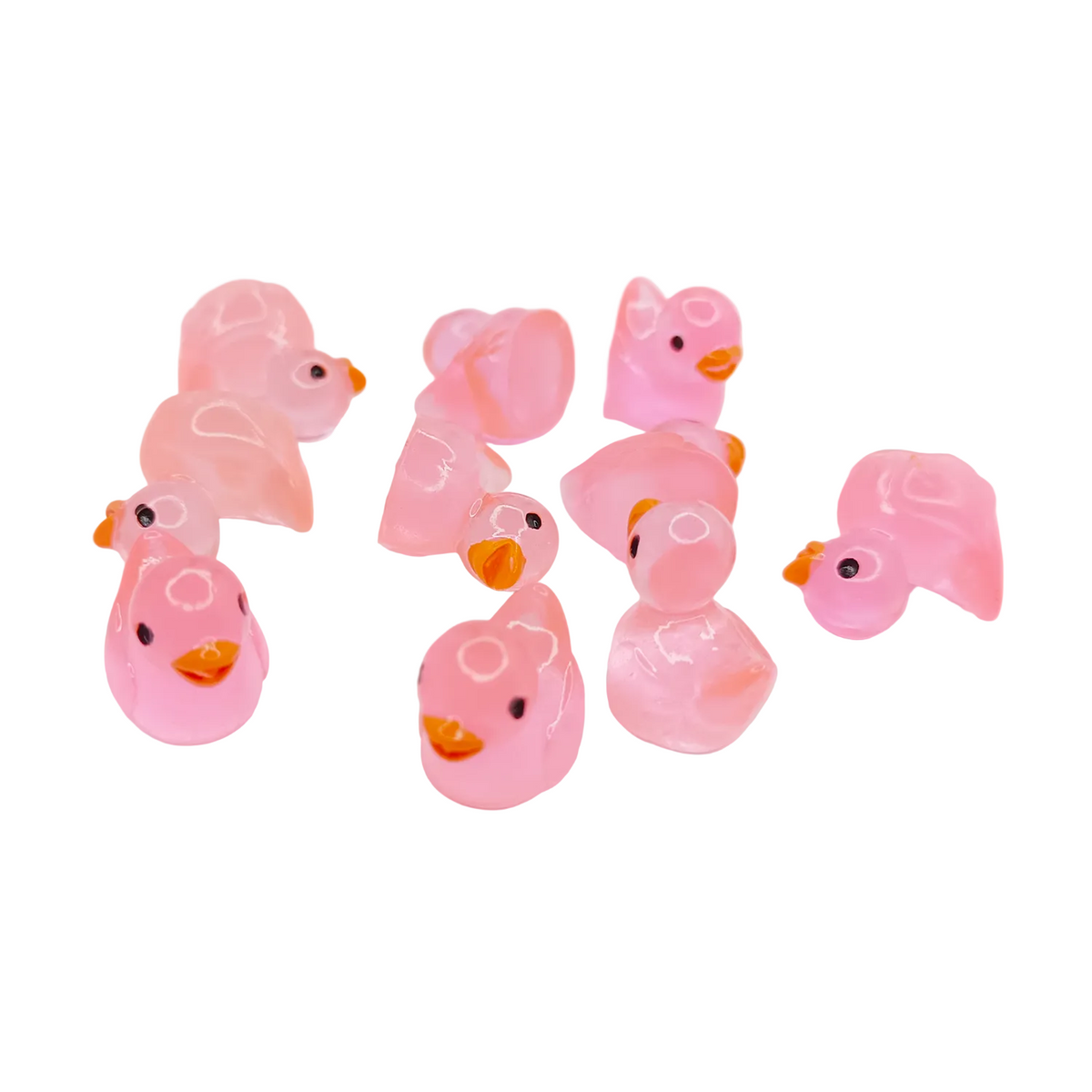 Pink duck figurine on a white background