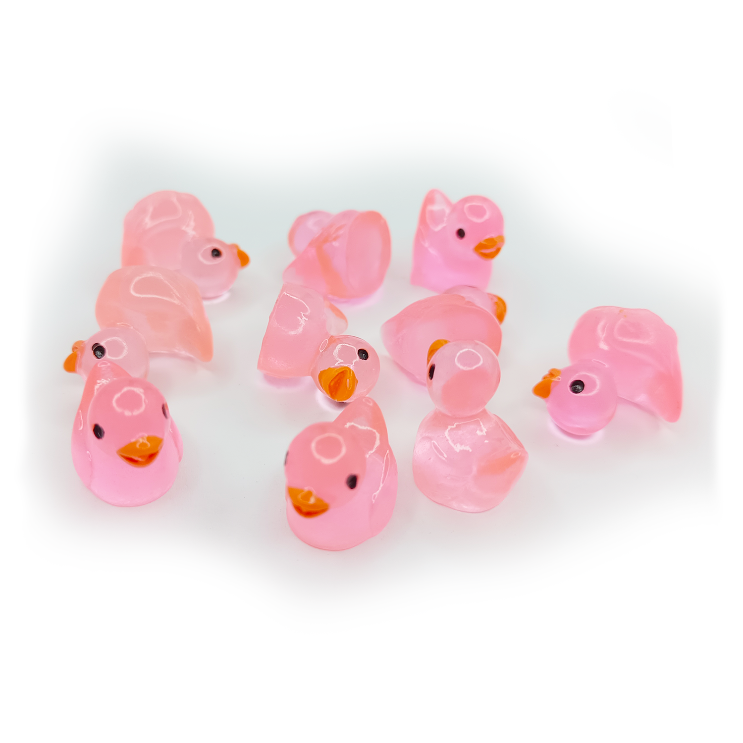 Pink duck figurine on a white background