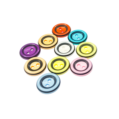 A group of ten colorful two-hole resin buttons arranged in a loose circle on a white background.