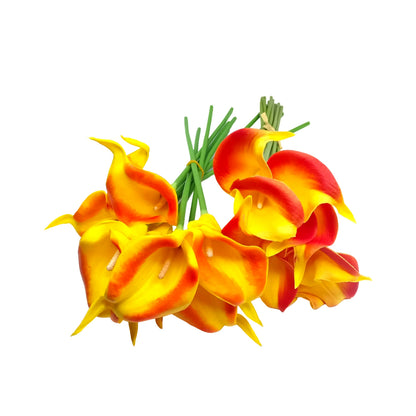 A bouquet of artificial calla lilies in yellow and red-orange tones with green stems, arranged on a white background.