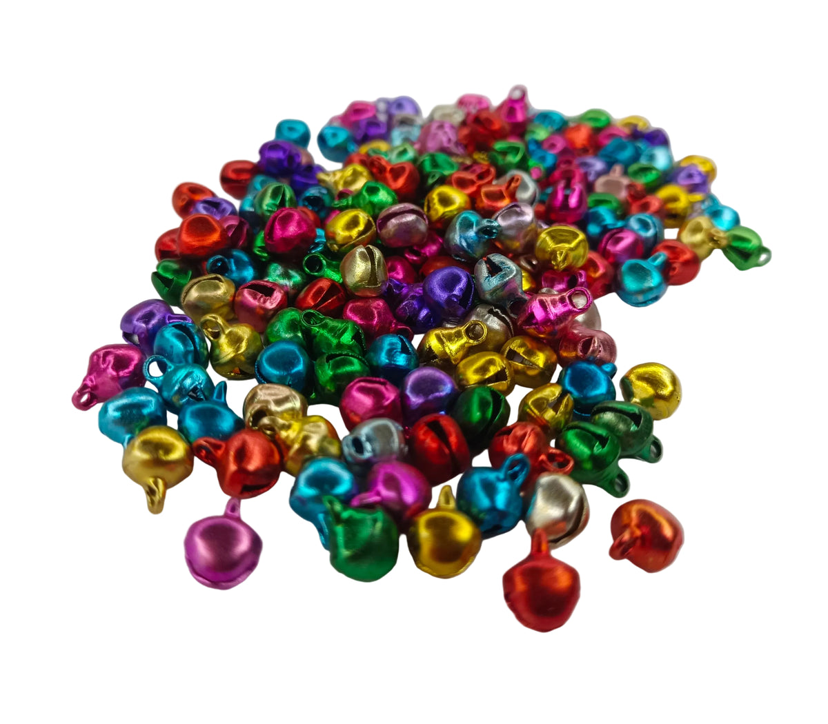 A pile of small metallic jingle bells in assorted bright colors, including pink, blue, green, yellow, orange, and silver, scattered on a plain white background.