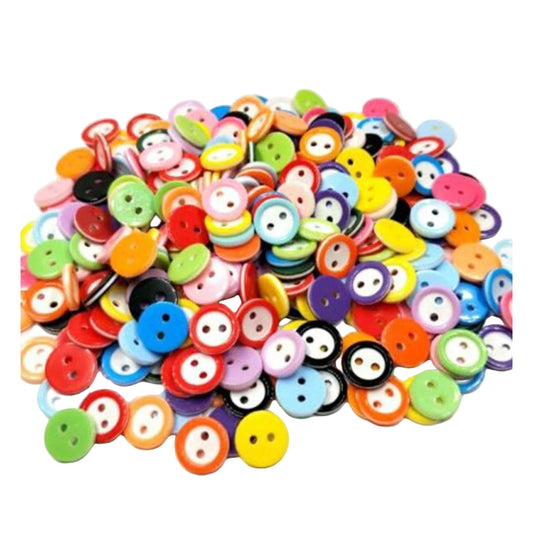 Assorted colorful buttons on a white background