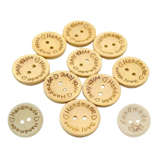 Wooden buttons with 'Handmade with love' text on a white background