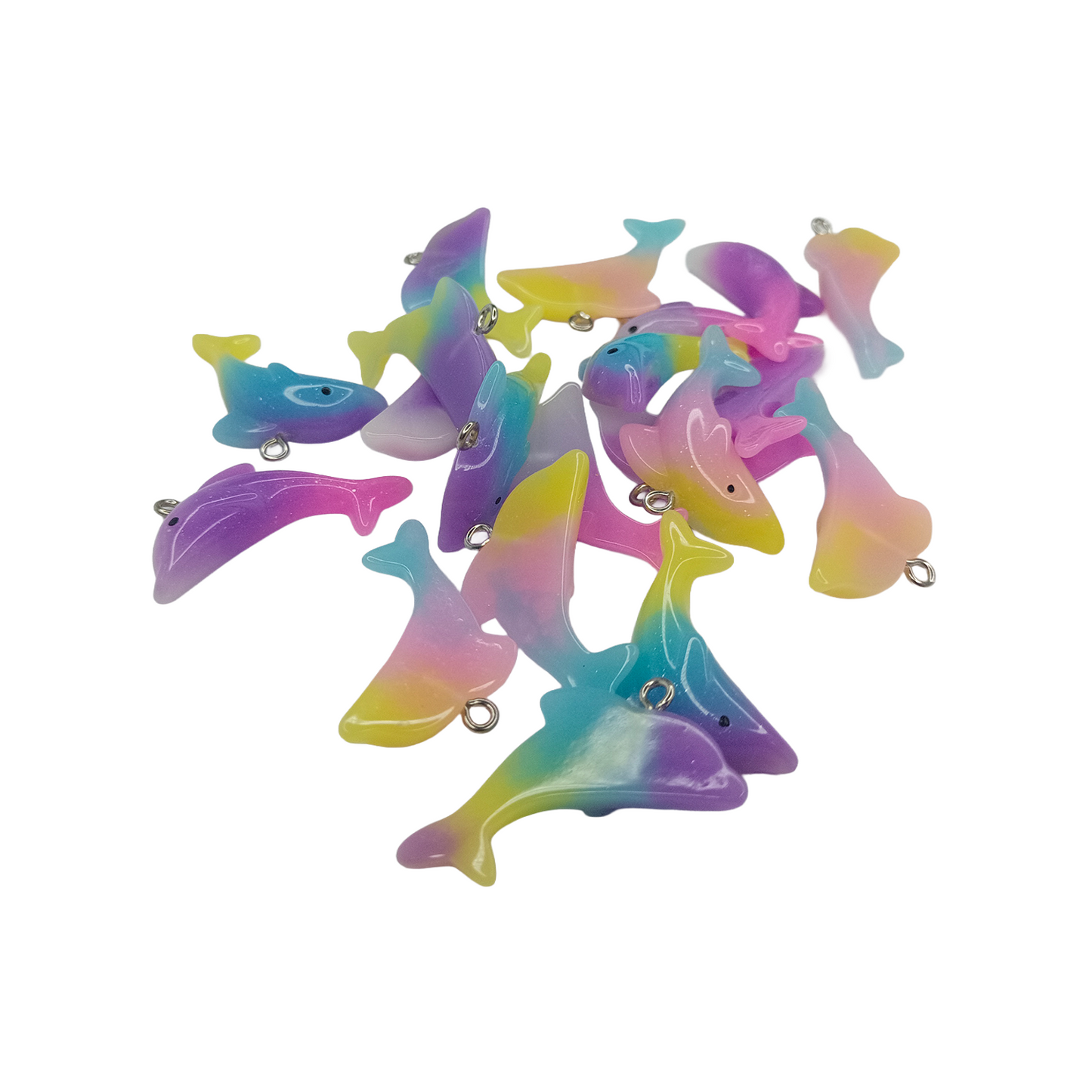 Colorful shark-shaped charms on a white background