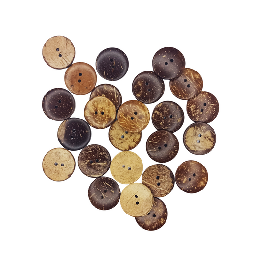Collection of coconut shell buttons on a white background