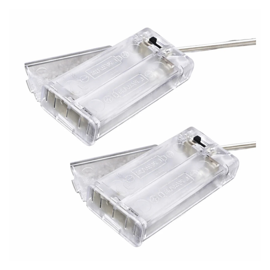 Two clear plastic battery holders 2xAA with wires lids and switch on a white background