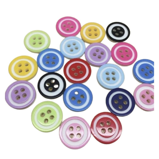 Assorted colorful buttons on a white background