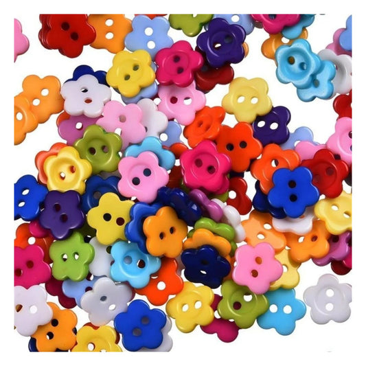 Assorted colorful flower-shaped buttons on a white background