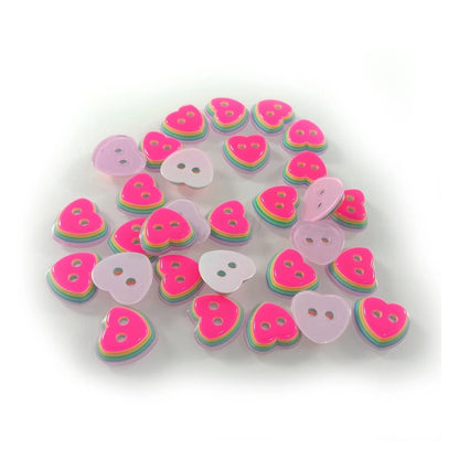 Colorful heart-shaped buttons on a white background