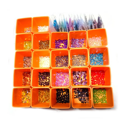 Orange container with compartments filled with various colored beads and sequins on a white background