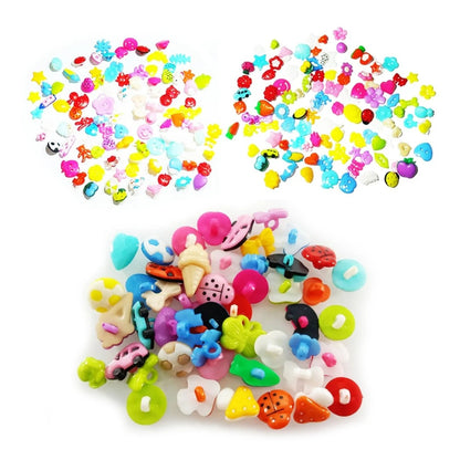 Assorted colorful plastic beads and charms on a white background