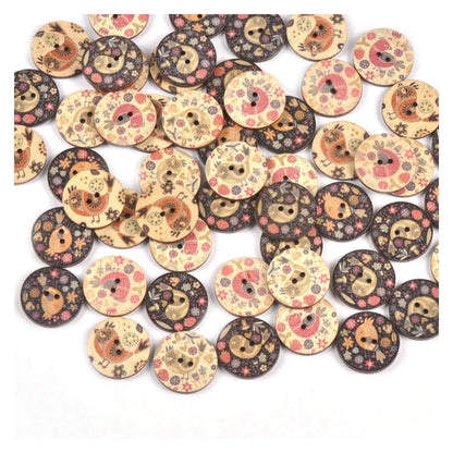 Collection of decorative buttons with floral and animal patterns on a white background