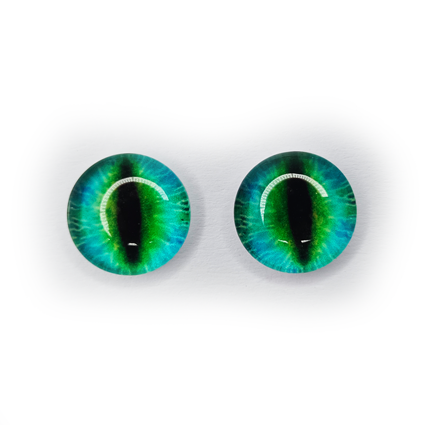 Pair of green and blue cat-like eyes on a white background | Asia Sell