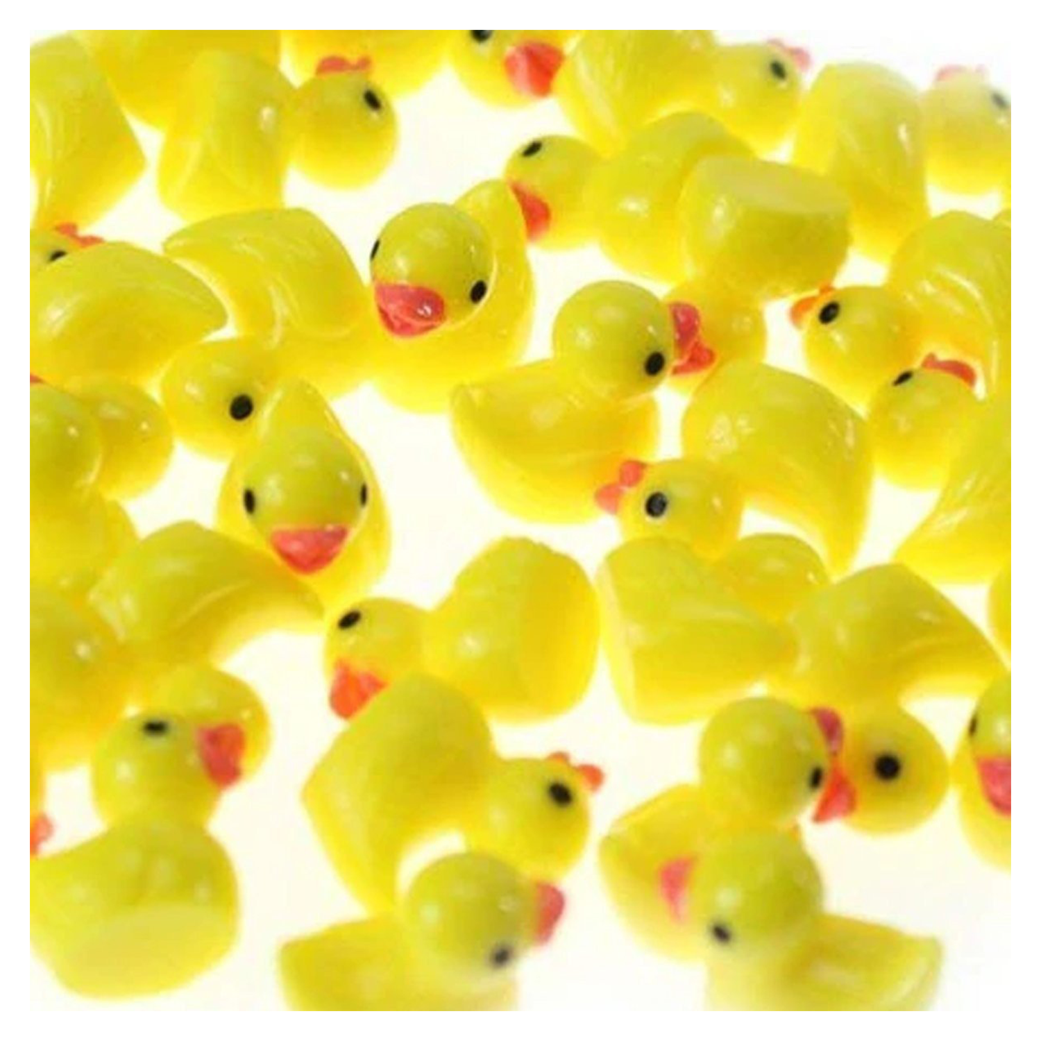 Multiple small yellow ducks with red beaks on a white background