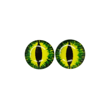 Set of colorful dragon dome shaped eye design glass cabochons on a white background