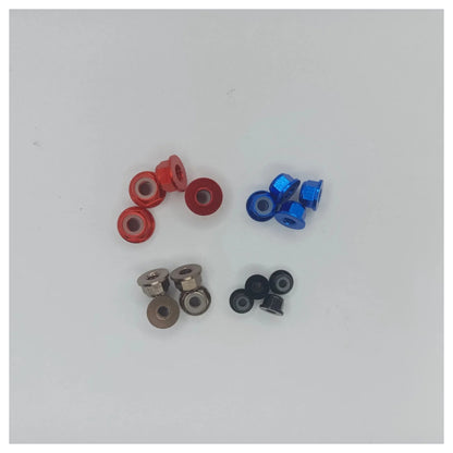 Assorted small metal bearings on a white background