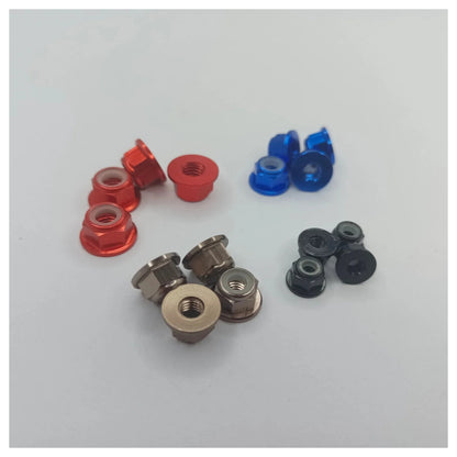 Assorted small metal bearings on a white background
