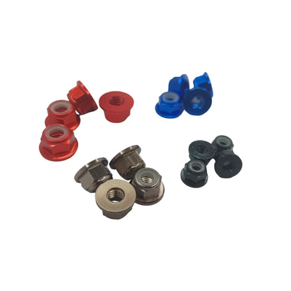 Assorted metal nuts in red, blue, and black on a white background