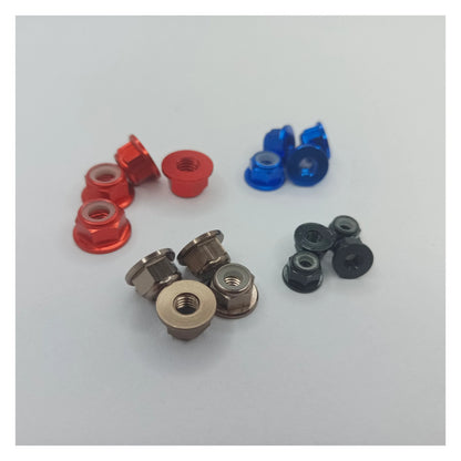 Assorted small metal bearings on a white background