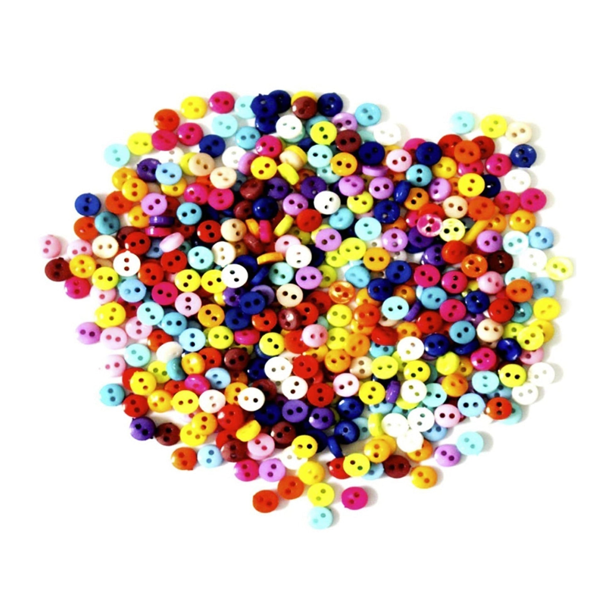 Assorted colorful round beads on a white background